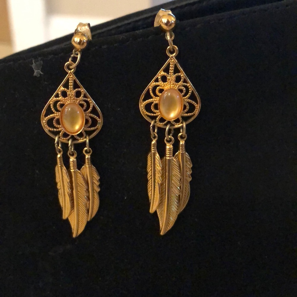 Gold feather earrings